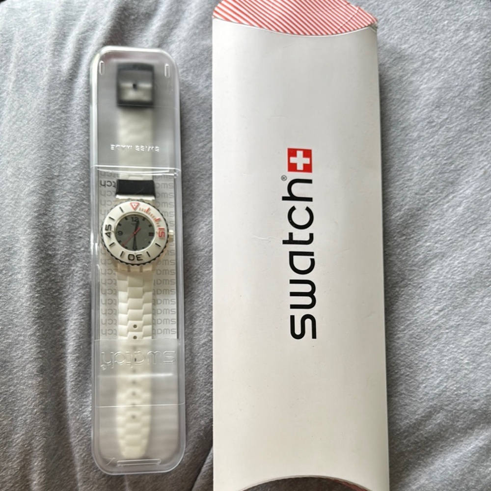Swatch Cream and Red Timepiece